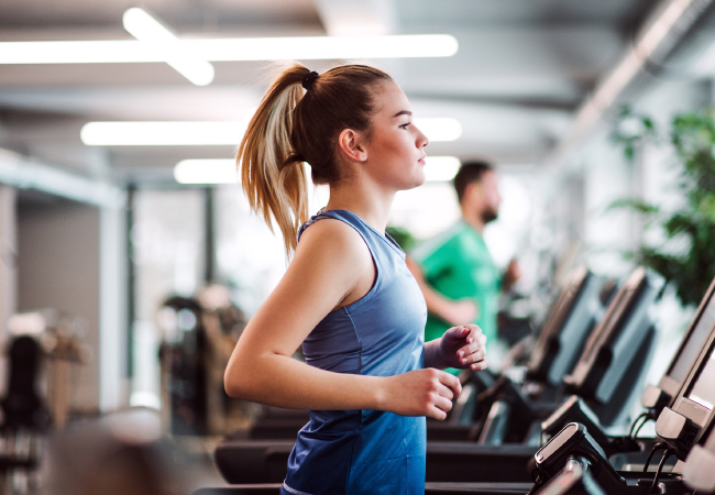 Healthy individual running on a treadmill.