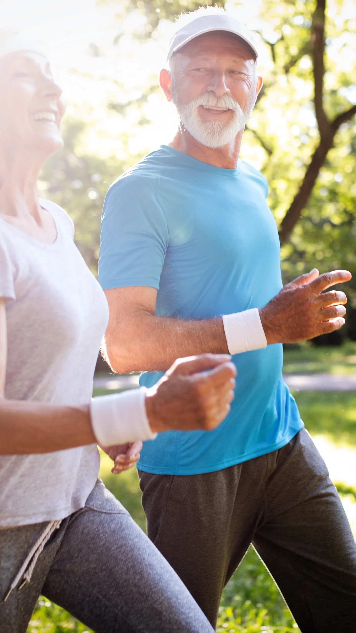 happy couple running outside without osteoarthritis pain